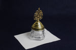 Load image into Gallery viewer, Glass inkwell for Arabic calligraphy with brass plated decorative lid
