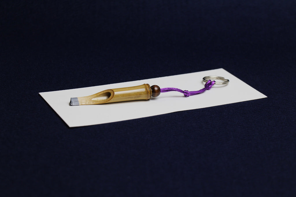 Bamboo keyring in shape of Arabic calligraphy qalam pen