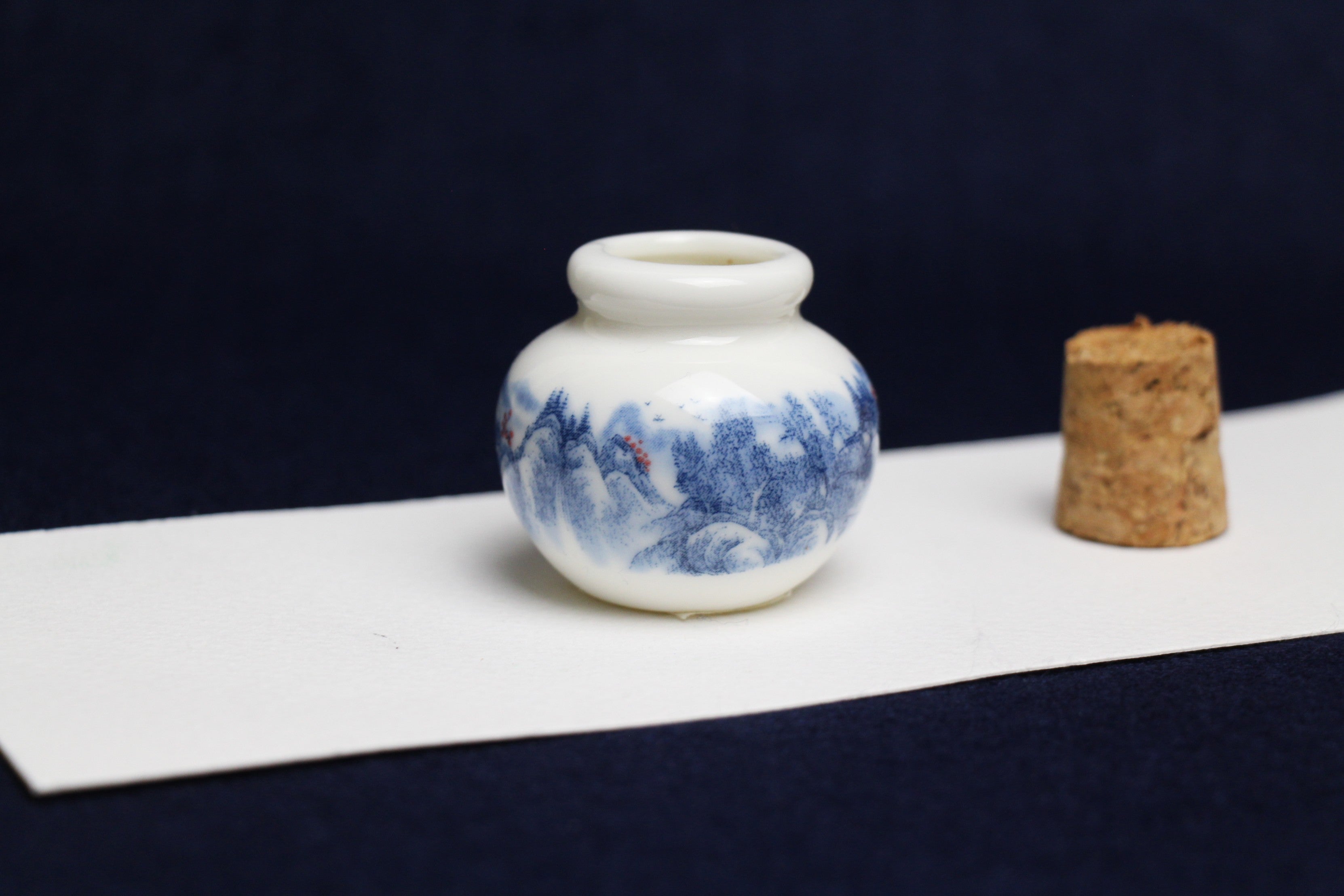 Small, white and blue ceramic inkwell with cork stopper (model 2)