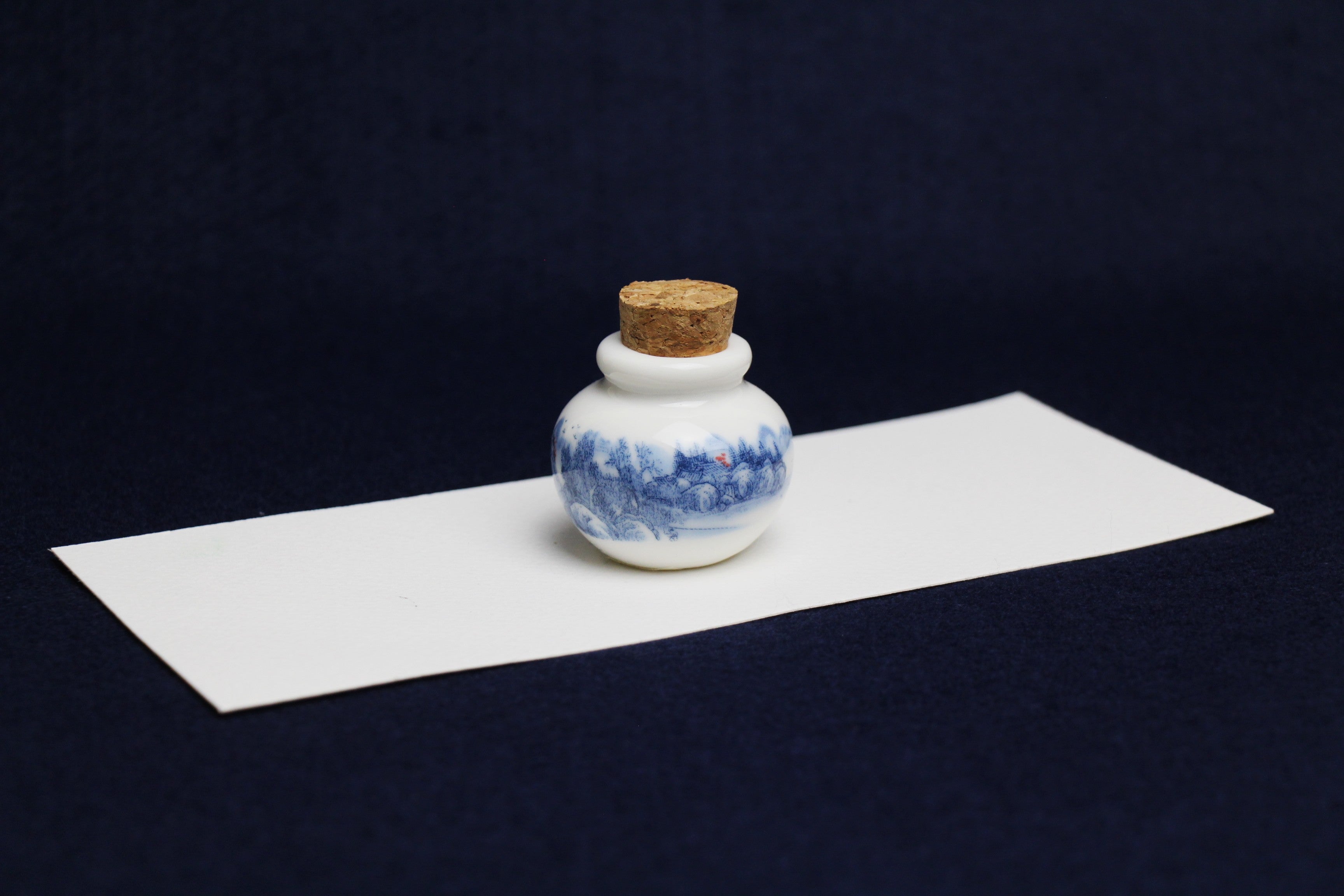 Small, white and blue ceramic inkwell with cork stopper (model 2)
