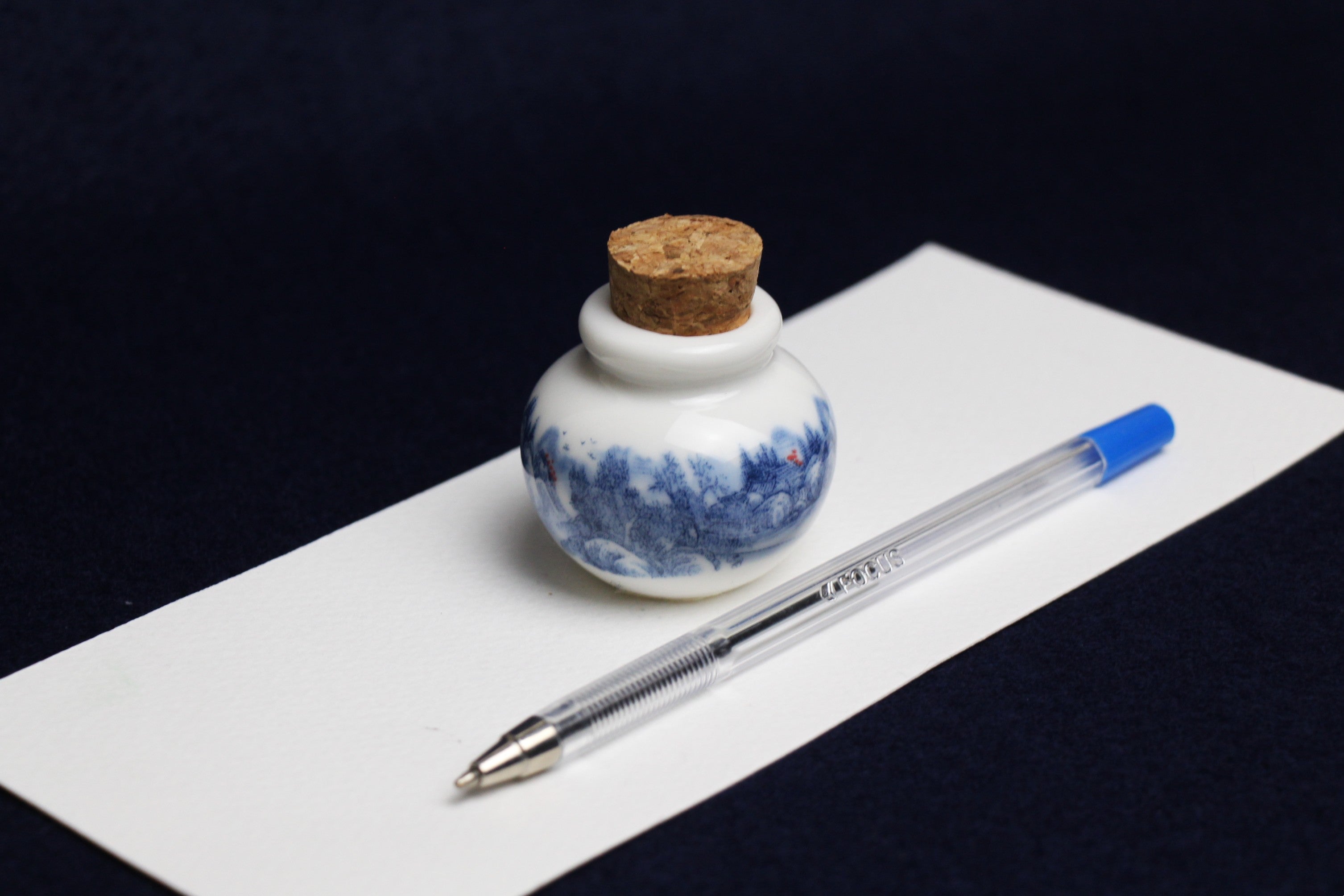 Small, white and blue ceramic inkwell with cork stopper (model 2)