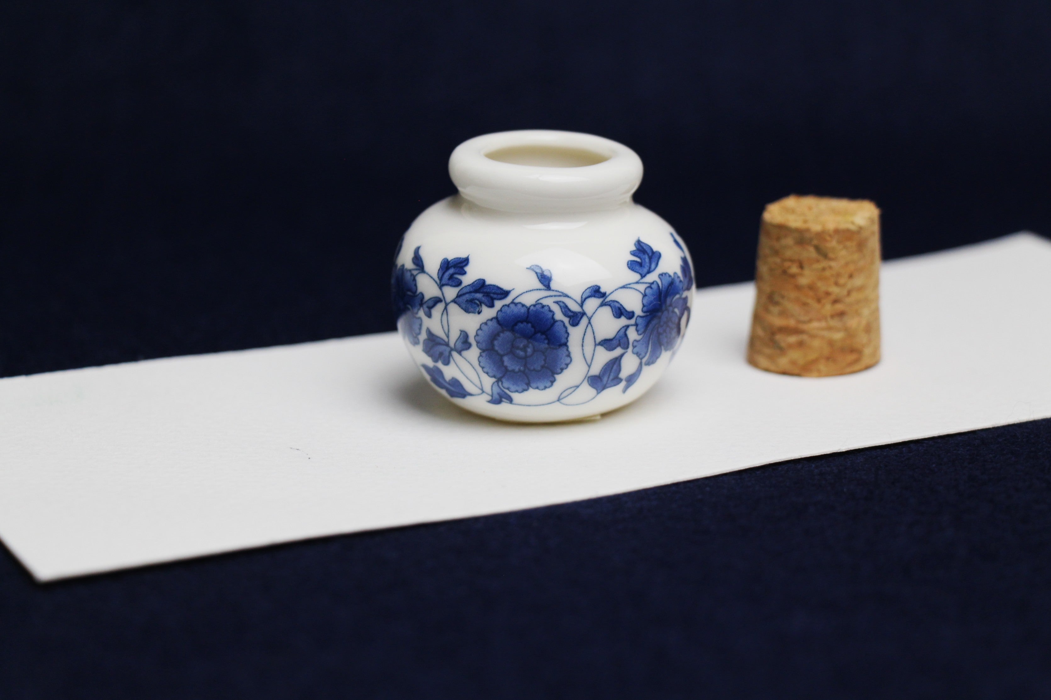 Small, white and blue ceramic inkwell with cork stopper (model 3)