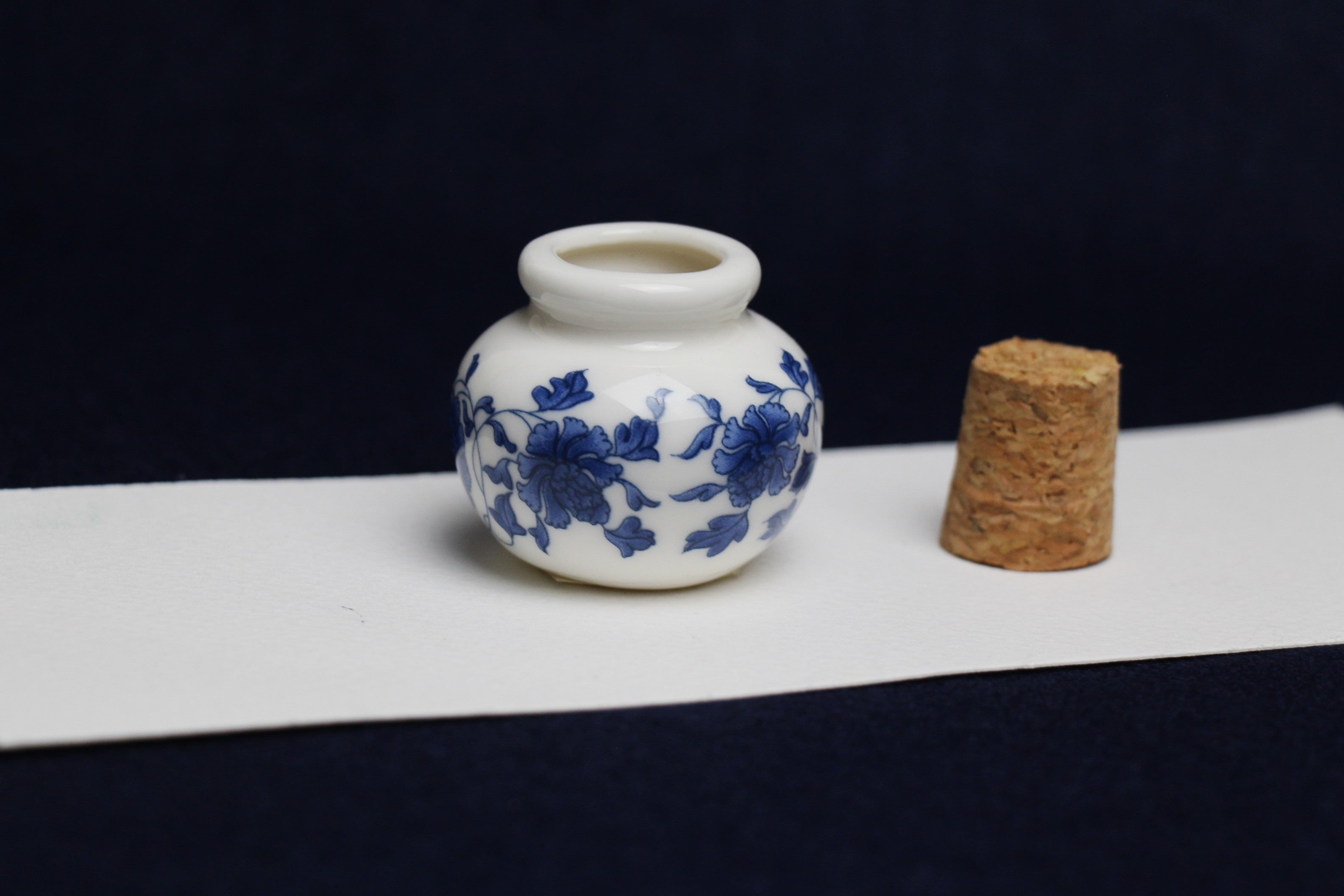 Small, white and blue ceramic inkwell with cork stopper (model 3)