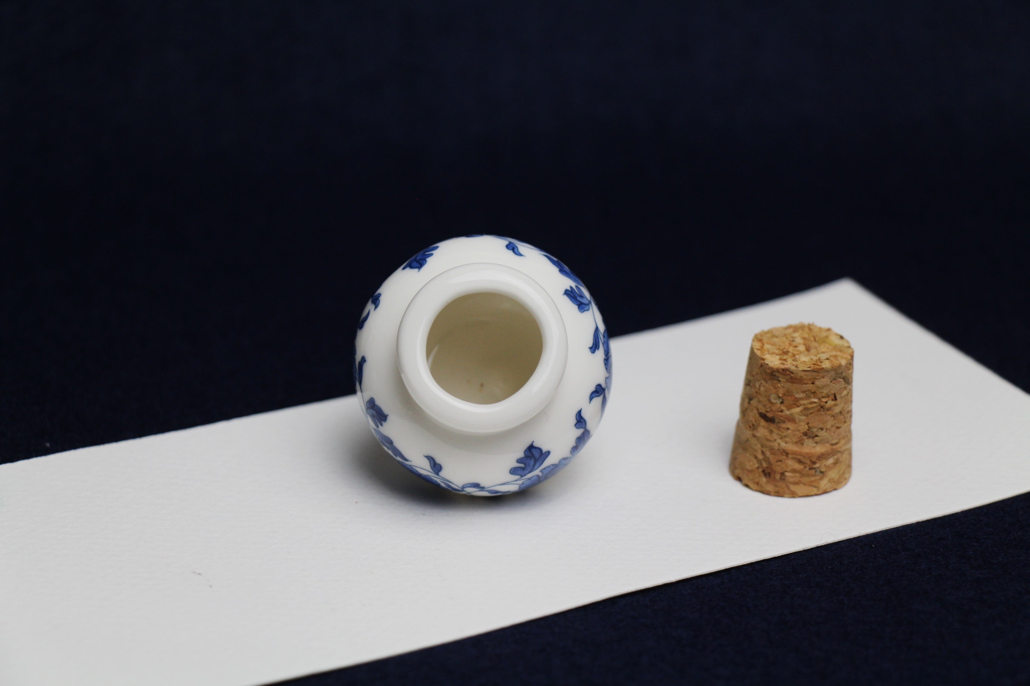 Small, white and blue ceramic inkwell with cork stopper (model 3)