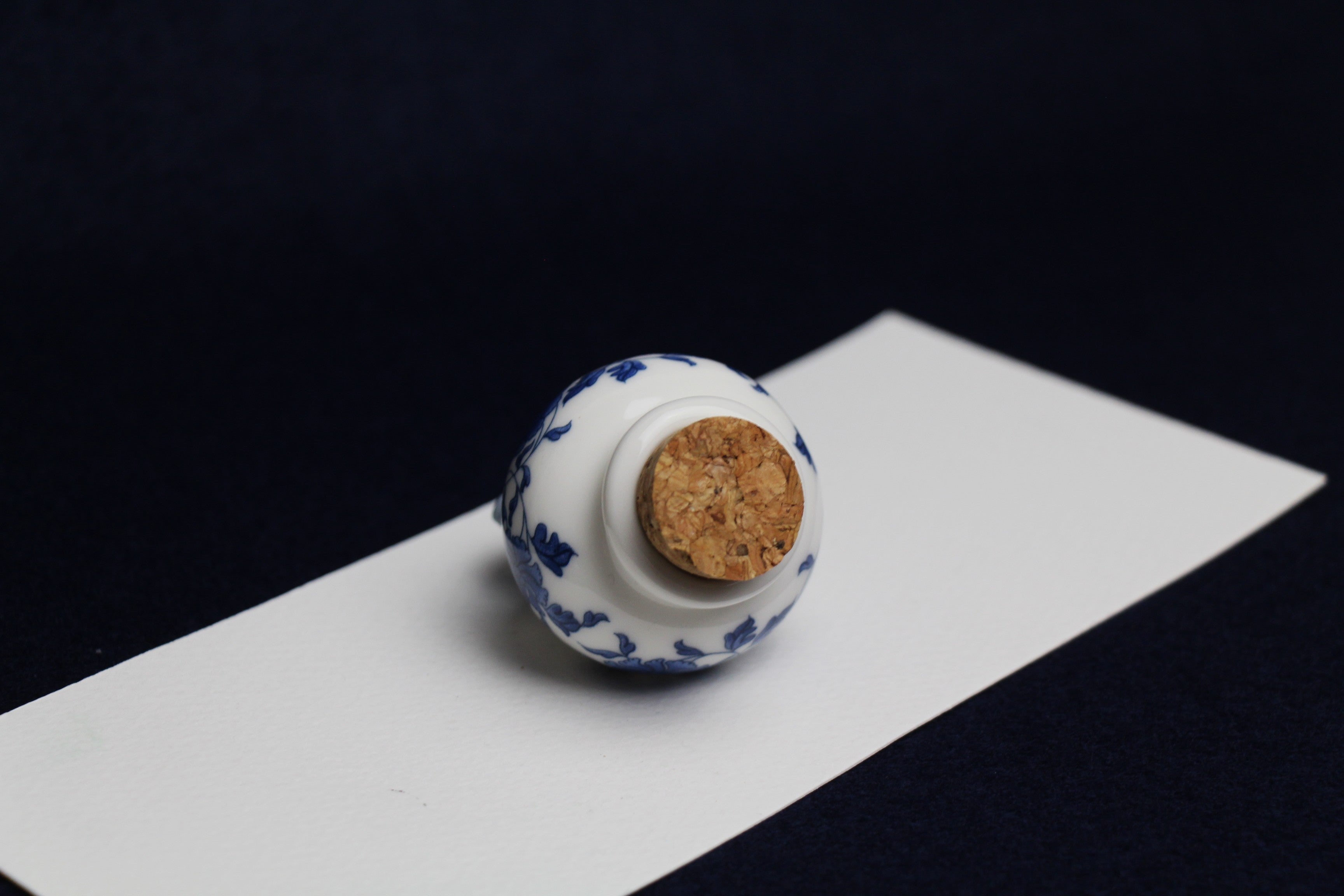 Small, white and blue ceramic inkwell with cork stopper (model 3)