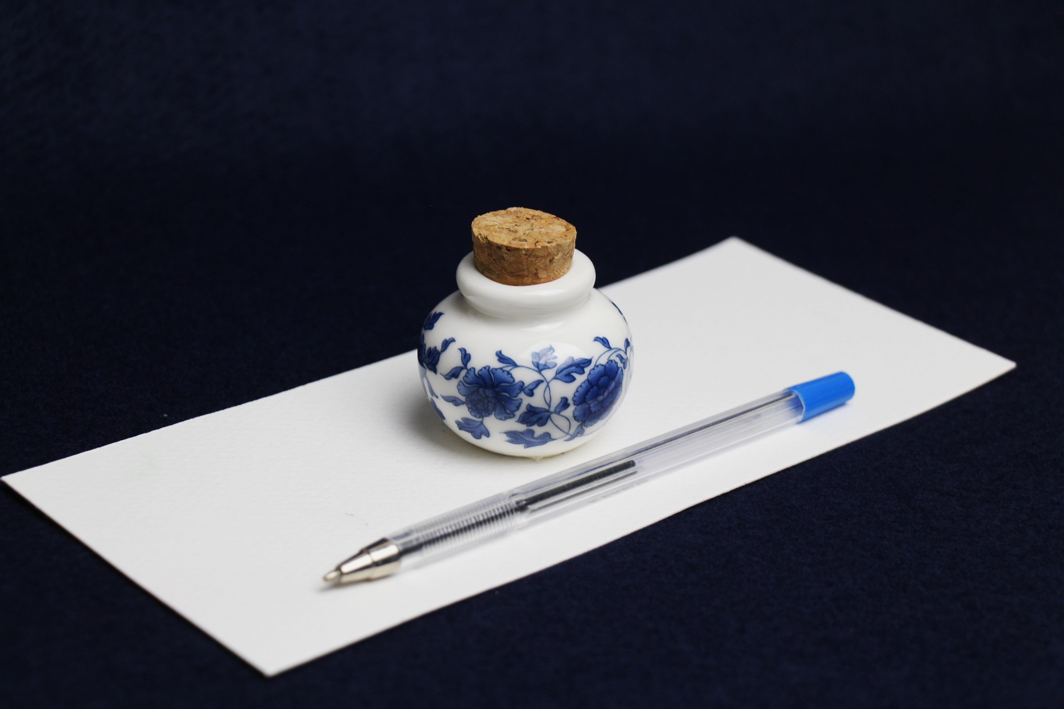 Small, white and blue ceramic inkwell with cork stopper (model 3)