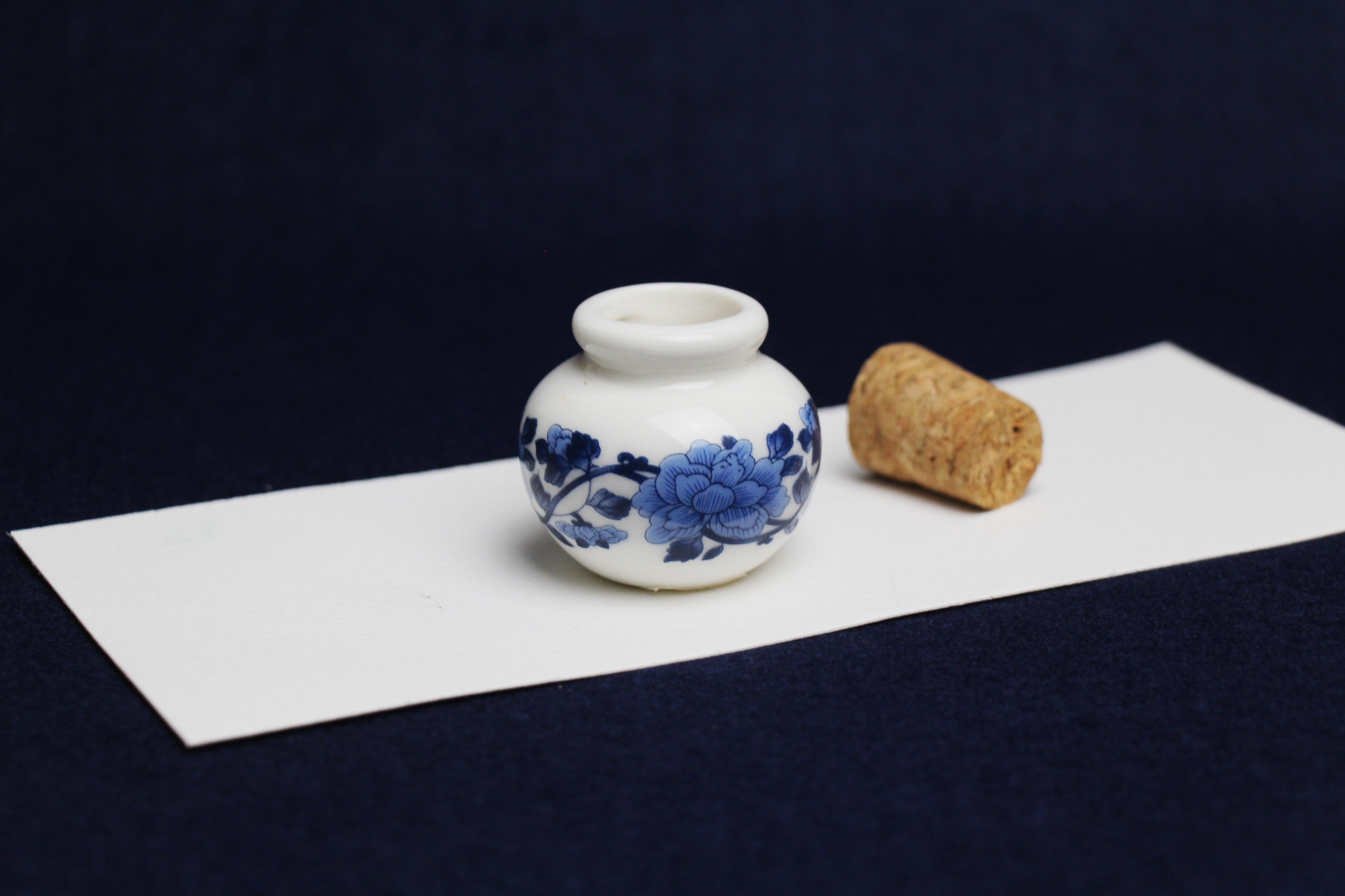 Small, white and blue ceramic inkwell with cork stopper (model 4)