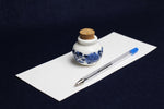 Load image into Gallery viewer, Small, white and blue ceramic inkwell with cork stopper (model 4)
