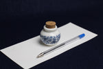 Load image into Gallery viewer, Small, white and blue ceramic inkwell with cork stopper (model 6)
