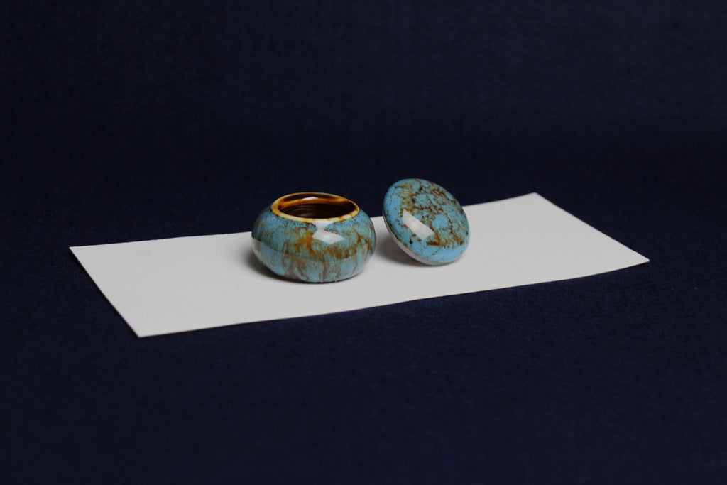 Small ceramic inkwell with twist-and-seal lid: teal marble