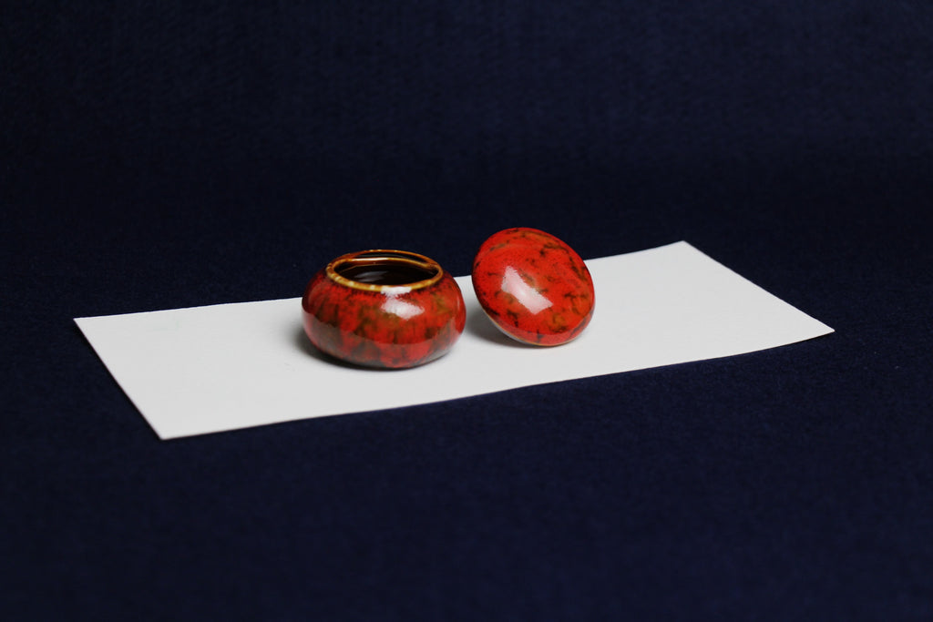 Small ceramic inkwell with twist-and-seal lid: red marble, for Arabic calligraphy