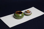 Load image into Gallery viewer, Small ceramic inkwell with twist-and-seal lid: dark sage green marble, for Arabic calligraphy
