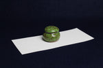 Load image into Gallery viewer, Small ceramic inkwell with twist-and-seal lid: dark sage green marble, for Arabic calligraphy
