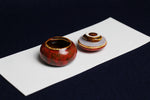 Load image into Gallery viewer, Small ceramic inkwell with twist-and-seal lid: red marble, for Arabic calligraphy
