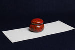 Load image into Gallery viewer, Small ceramic inkwell with twist-and-seal lid: red marble, for Arabic calligraphy
