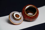 Load image into Gallery viewer, Small ceramic inkwell with twist-and-seal lid: red marble, for Arabic calligraphy
