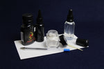 Load image into Gallery viewer, Ink kit: ink, inkwell, likka, rose water, water bottle, porcupine quill, transfer pipette
