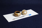 Load image into Gallery viewer, Small ceramic inkwell with twist-and-seal lid: cream marble
