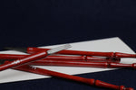 Load image into Gallery viewer, Set of 5 qalams for Arabic calligraphy with ebony nibs: 1 to 5 mm - distressed red handle
