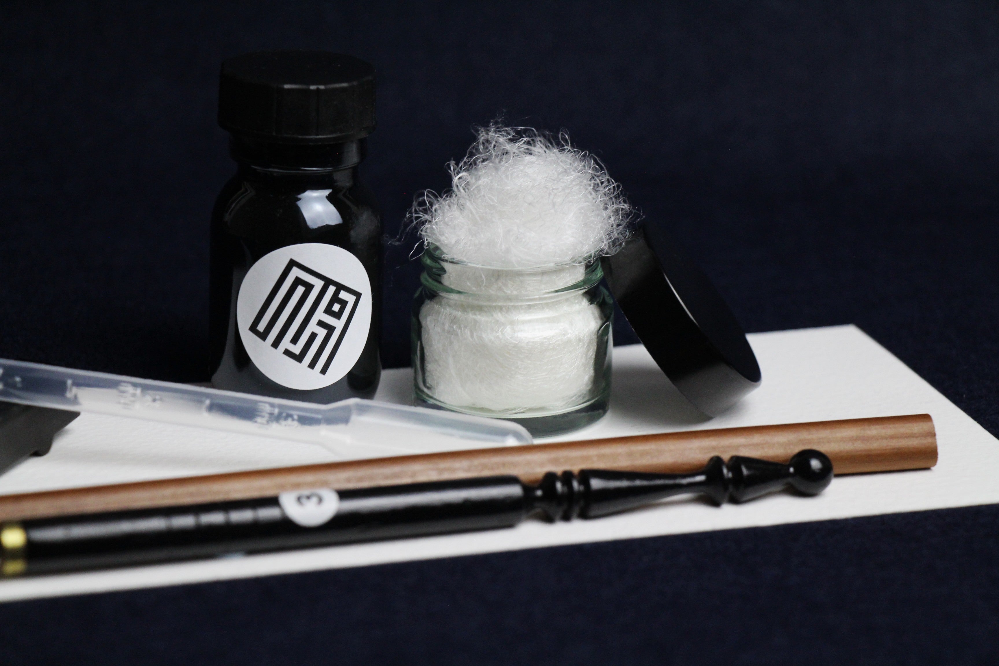 Small set for Arabic calligraphy - two dip pens with left oblique nib - Javi, handam, small glass inkwell with silk killa, black Indian ink in glass bottle, black metal pen rest and plastic transfer pipette