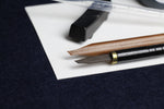 Load image into Gallery viewer, Small set for Arabic calligraphy - two dip pens with left oblique nib - Javi, handam, small glass inkwell with silk killa, black Indian ink in glass bottle, black metal pen rest and plastic transfer pipette
