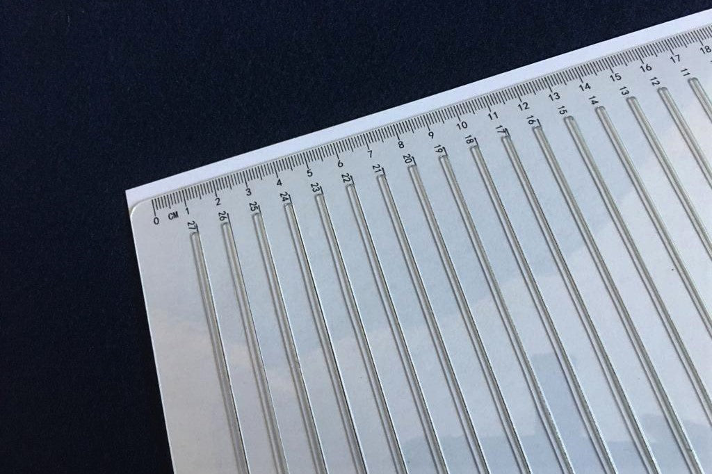 Plastic straight line stencil for A4 sized paper - 27 lines with 10 mm line gap