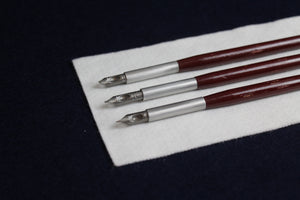 German oblique nib dip qalam pen for Arabic calligraphy with deep red wooden handle with distressed finish