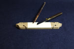 Load image into Gallery viewer, Large bone makta in wooden block for cutting pens for Arabic calligraphy
